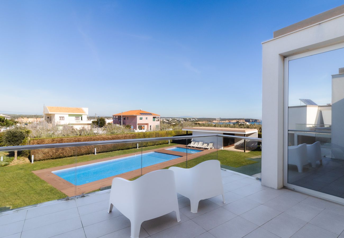 Maison avec vue sur la plage.