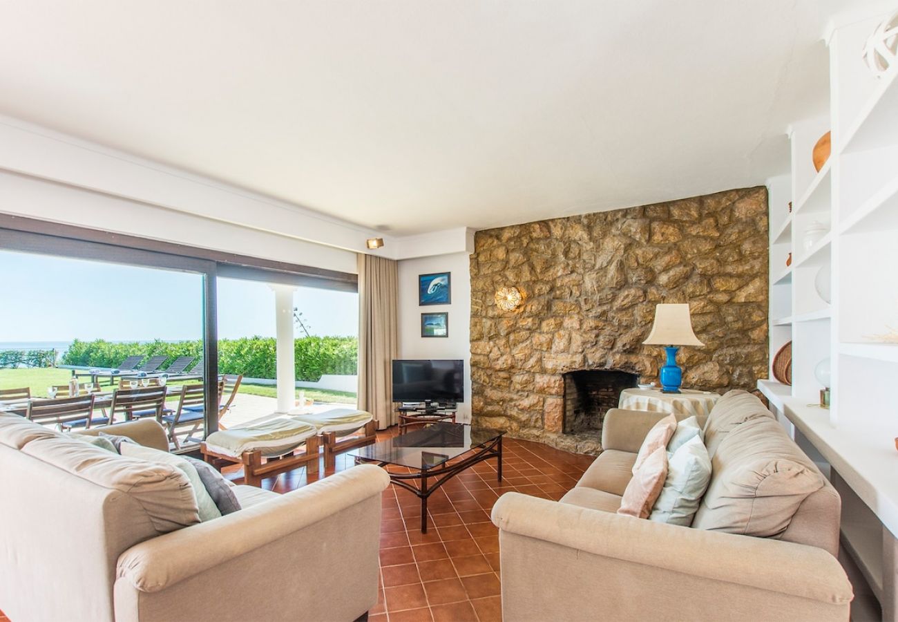 Living room overlooking the garden and outdoor area.