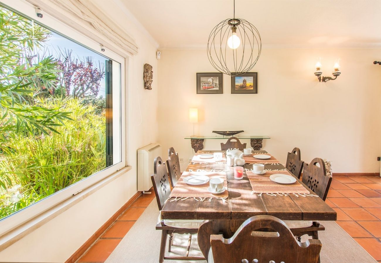 Rustic dining room with plenty of natural light.