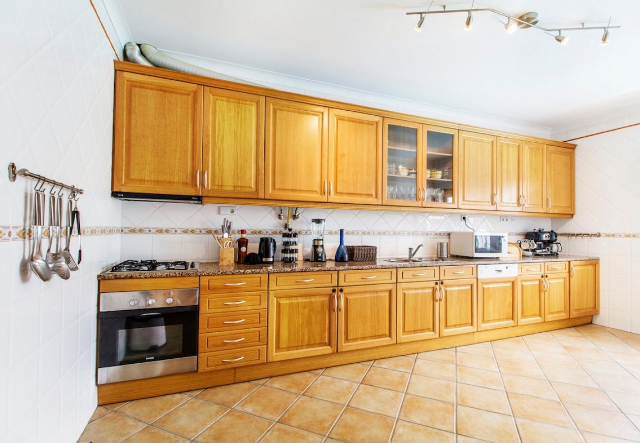 Fully equipped kitchen with all amenities.