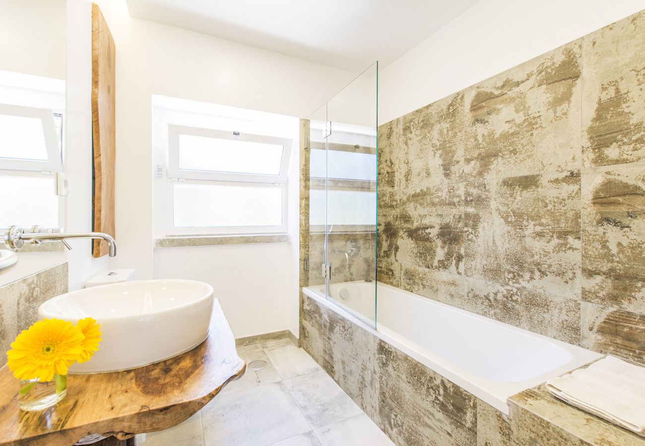 Rustic style bathroom with window.