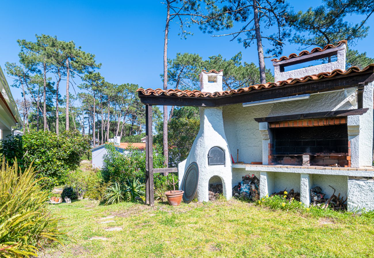 Outdoor area with barbecue.