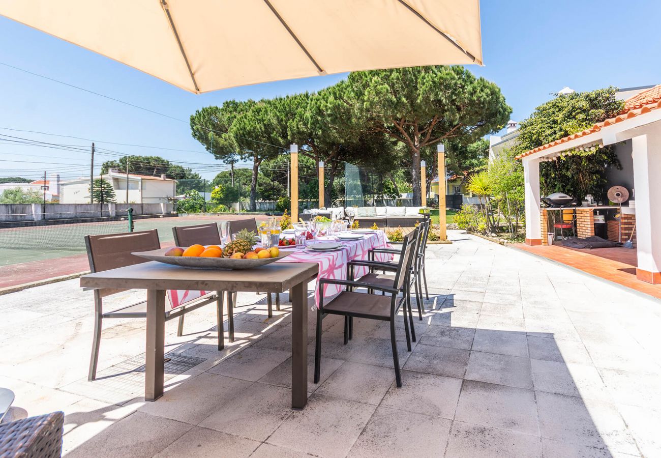 House with outdoor space and dining area.