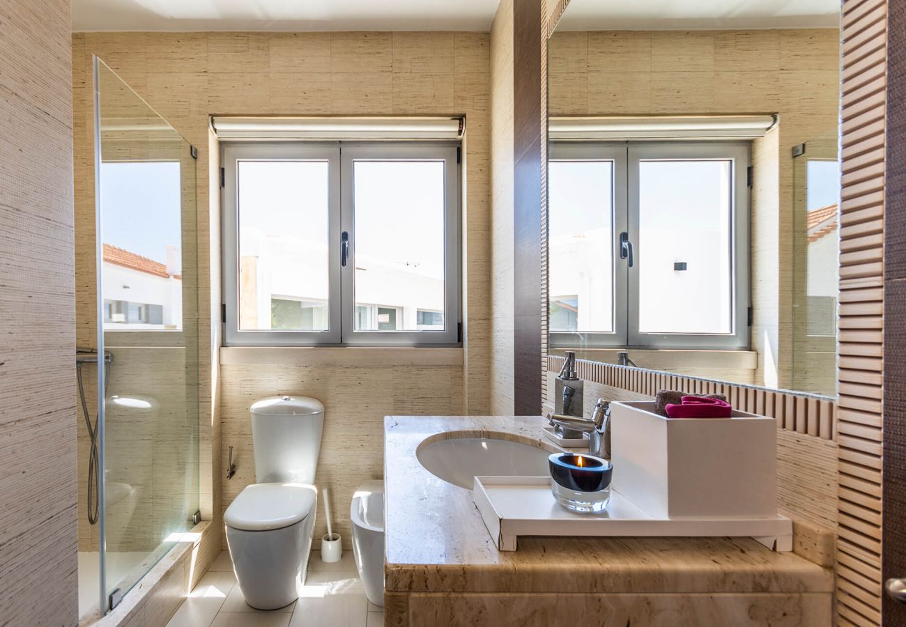 Bathroom with window and all amenities.