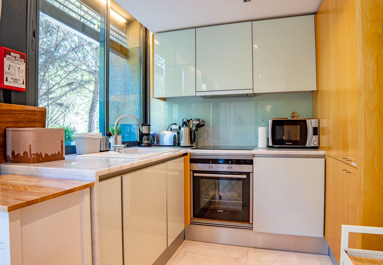 Kitchen with all equipment and dining space.